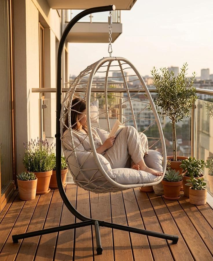 DoubleTT Wicker Egg Chair with Stand on a front porch